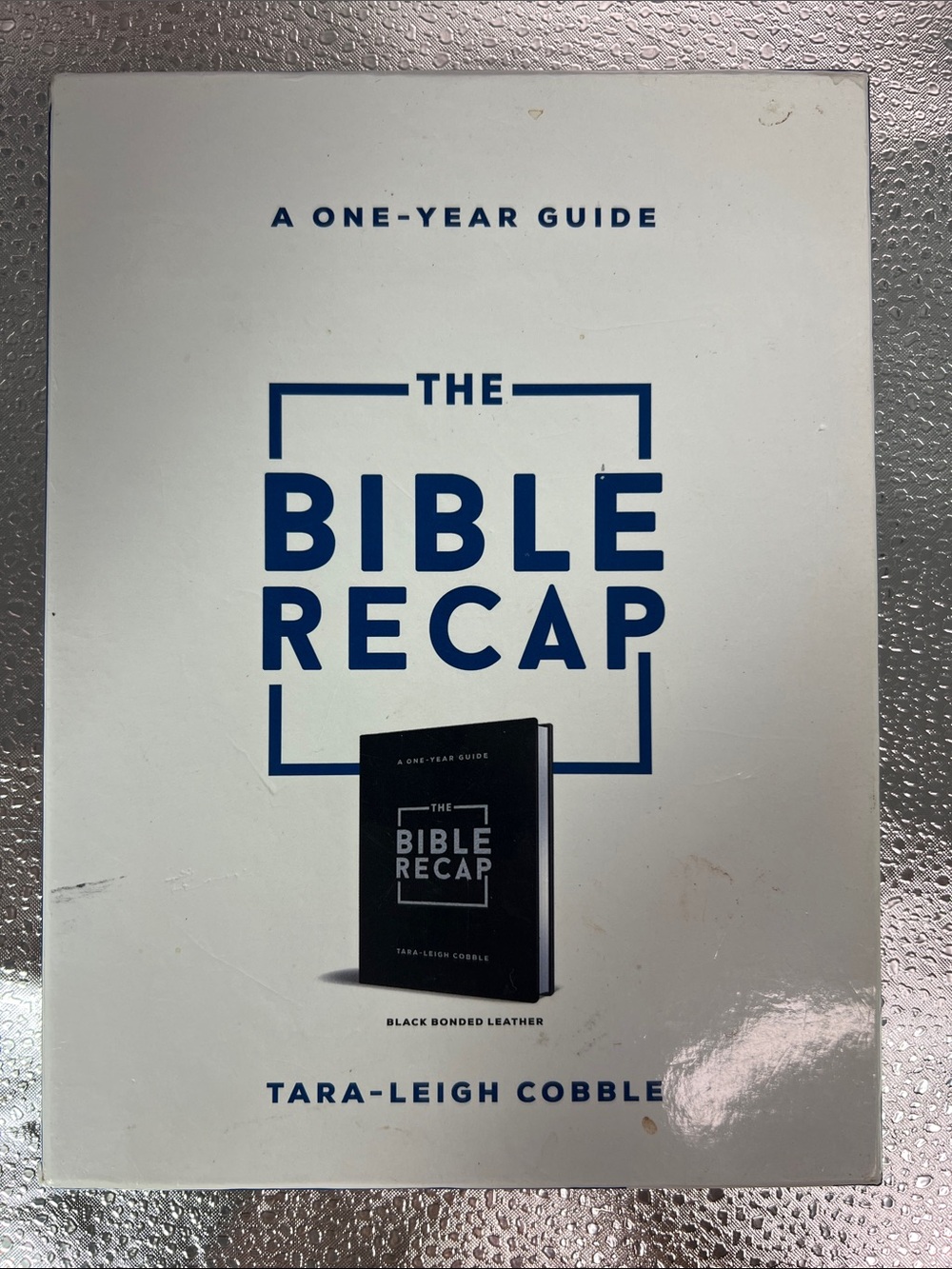 The Bible Recap Coffee Table Guide — White & Blue Accent. Black Bonded Leather